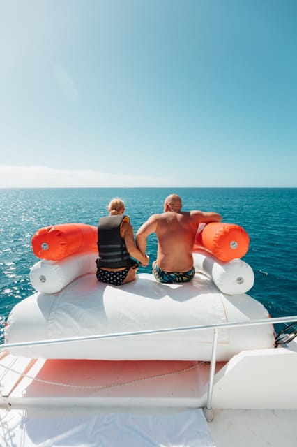 Costa Adeje: Private Yacht Trip with Watersports and Slides - Gulliver Fun Yacht at Puerto Colón: your floating playground