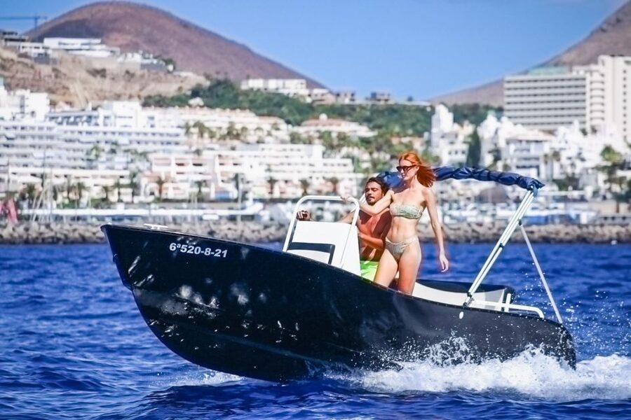 Flow into the ocean without license and discover Adeje - What You Get on Board (Bimini Shade, Bluetooth Tunes, and a Non-Electric Cooler)