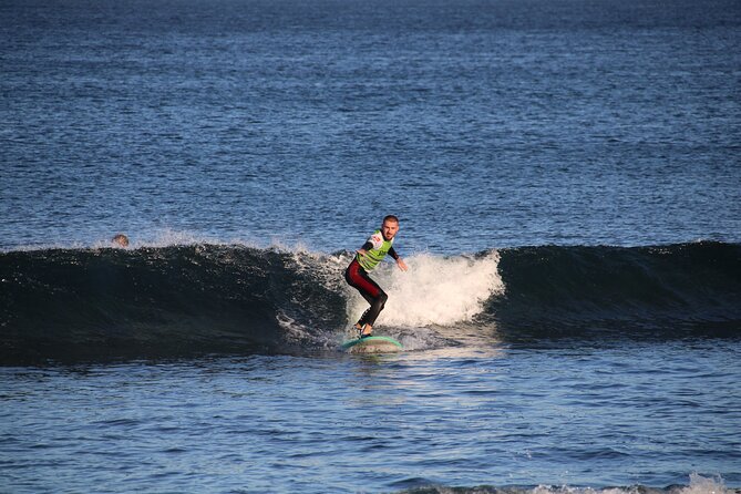 Private Surfing Lesson at Playa de las Américas - Gear that removes the usual friction (surfboard, booties, wetsuit)
