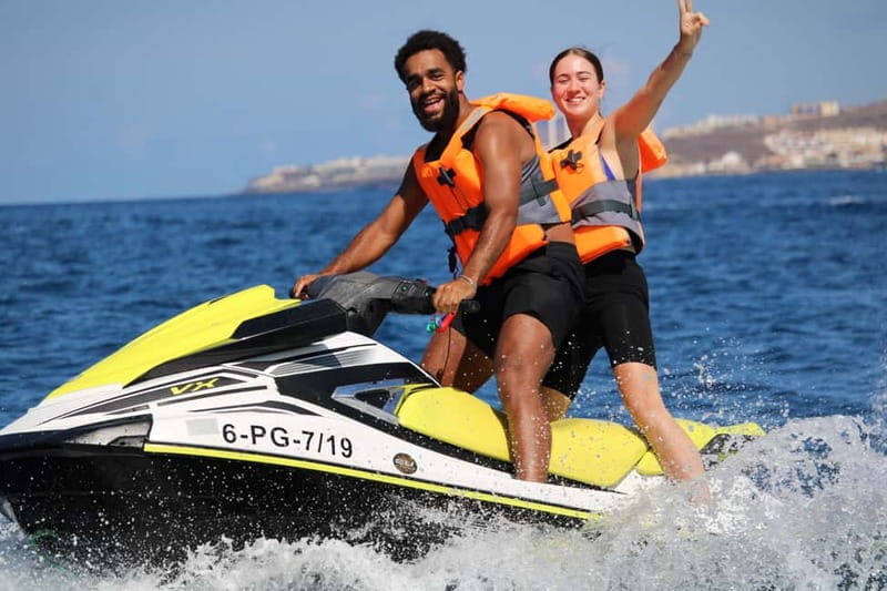 Puerto Colón: Tenerife Coast Jet Ski Tour with Photos - The Photo Stop and 5-Minute Swim: Where the Tour Changes Pace