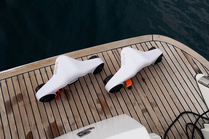 Shared Luxury Yacht Cruise with Champagne and Tapas - Playa del Duque water time: scooters, boards, and snorkeling gear included