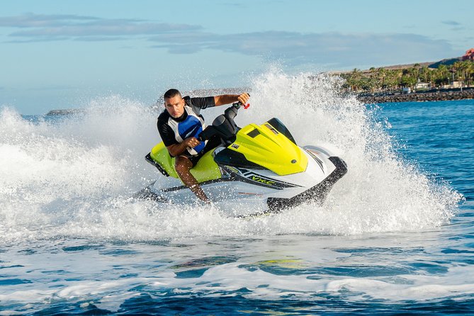 Single Jet Ski Safari 1-Hour Guided Your of Tenerife - Entering The Day: Meeting at Puerto Colón and Getting Ready