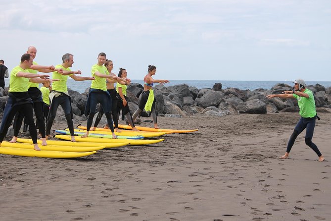 Surf Class Experience in Playa de la Américas - In the water for about an hour: coached practice for beginners