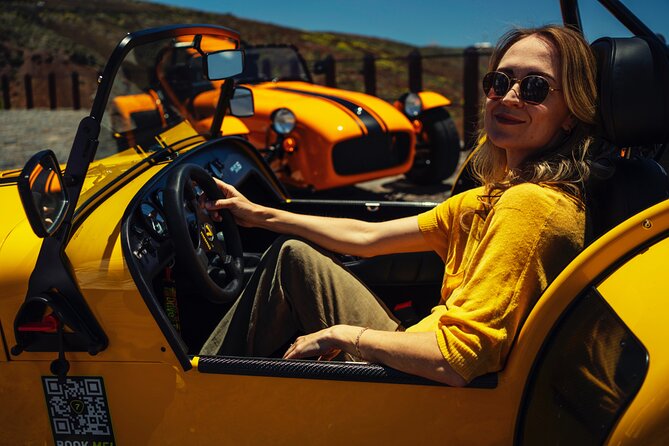 T EN erife at the wheel of a Caterham Lotus 7 - Price, Deposit, and Driving Rules: Is It Good Value?