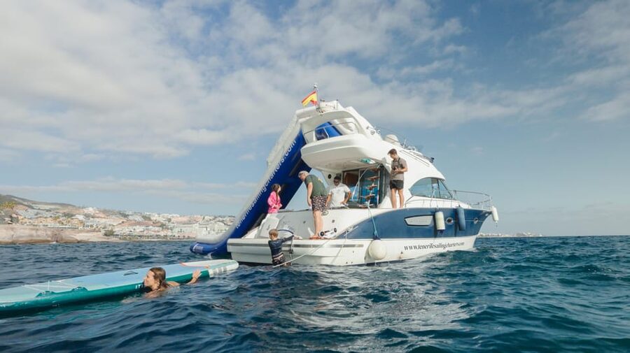 Tenerife: Private Luxury Yacht Sunset Cruise - La Caleta water time: snorkeling, swimming, paddleboarding, and wildlife chances