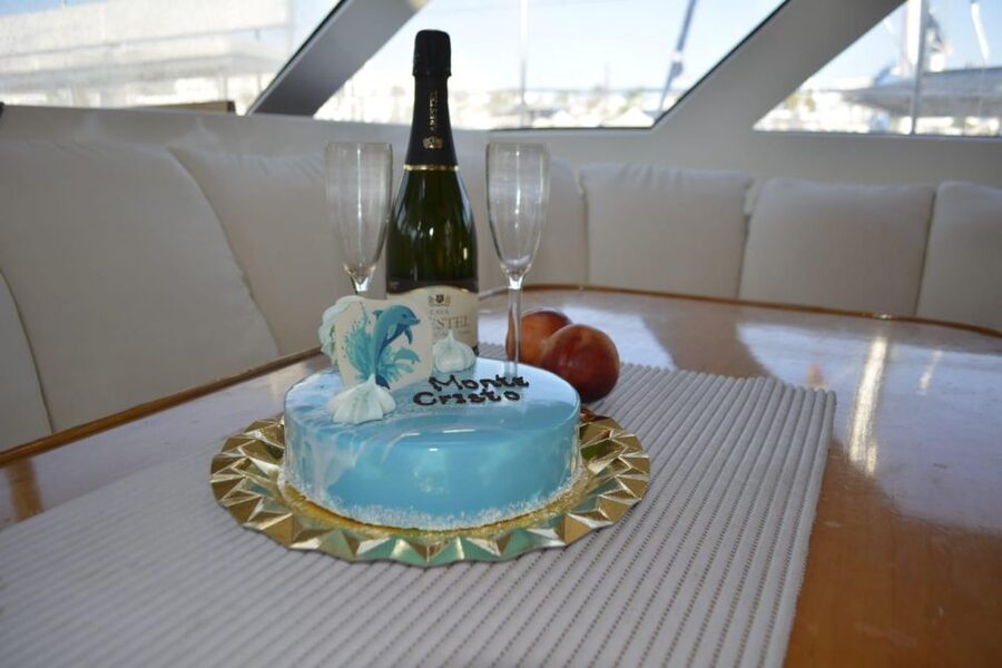 Tenerife: Sunset Catamaran Tour with Transfer, Buff & Drinks - The onboard vibe: drinks, tapas, fruit, and music in the salt air